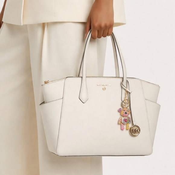 Michael Kors Handbags - Michael Kors White Tote with Bear Charm Added EUC LIKE NEW